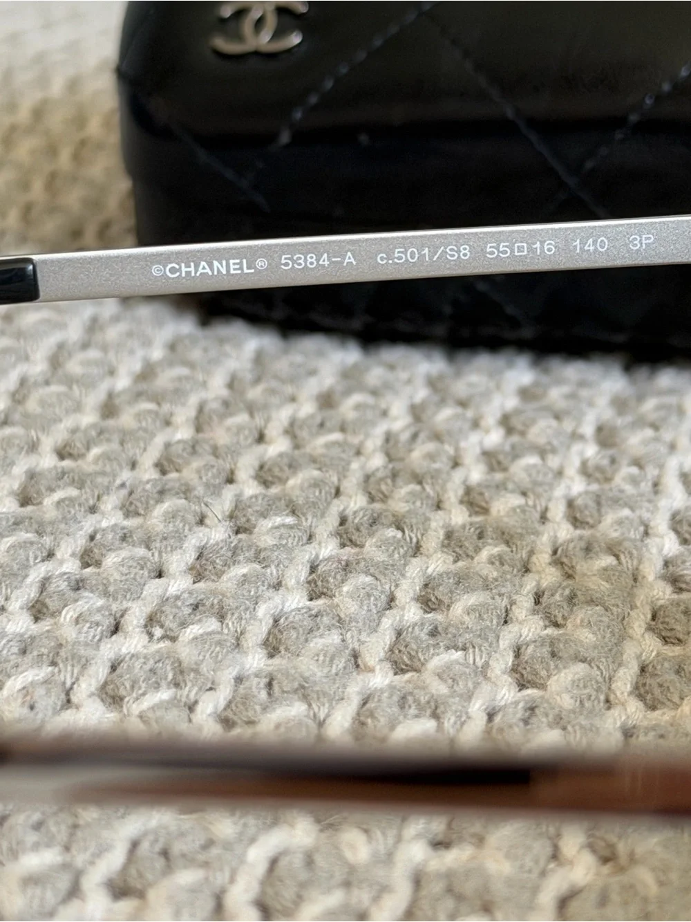CHANEL Black Cat-Eye Sunglasses with Quilted Logo Case